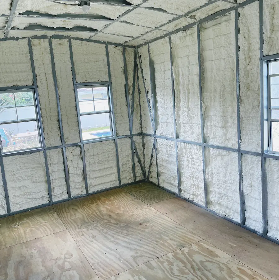 Closed-cell spray foam insulation applied to wall cavities in a residential project in Renton